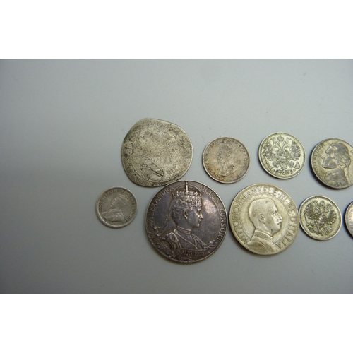 7044 - A collection of coins including Australia, Canada, Russia, an Italian 2 lire, and a British medallio... 