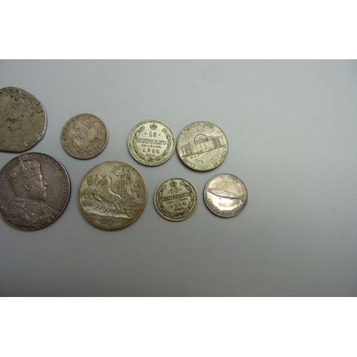 7044 - A collection of coins including Australia, Canada, Russia, an Italian 2 lire, and a British medallio... 