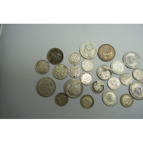 7054 - A collection of half silver coins, 64g
