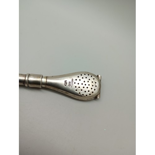 7346 - An Argentinian .800 silver and 18k gold plated tea straw, 39g, 20cm