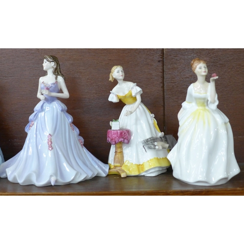 2012 - A large collection of porcelain figurines Royal Doulton and Coalport to include nine large figures a... 