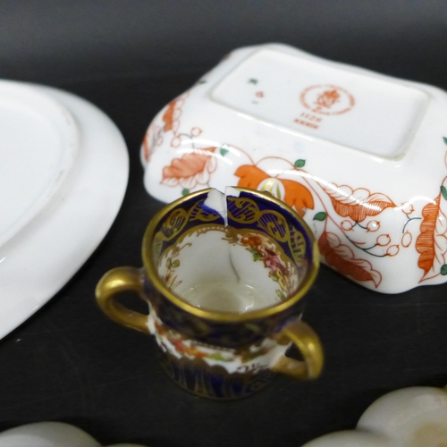 2027 - A collection of Royal Crown Derby Imari pattern pieces comprising oval tray, circular dish, rectangu... 