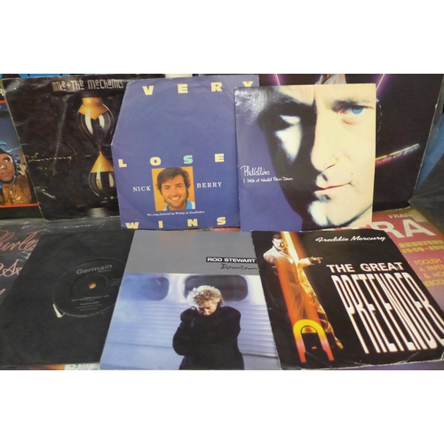 2057 - A collection of vinyl records to include The Beatles, The Cars, Shirley Bassey, Fleetwood Mac, etc.