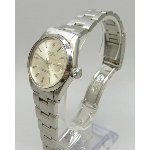 7308 - A Rolex Oyster Perpetual date wristwatch with stainless steel case, silvered dial, automatic movemen... 