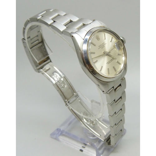7308 - A Rolex Oyster Perpetual date wristwatch with stainless steel case, silvered dial, automatic movemen... 