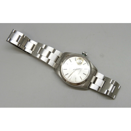 7308 - A Rolex Oyster Perpetual date wristwatch with stainless steel case, silvered dial, automatic movemen... 