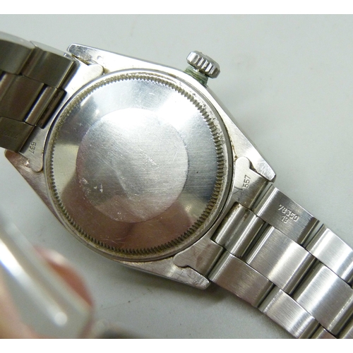 7308 - A Rolex Oyster Perpetual date wristwatch with stainless steel case, silvered dial, automatic movemen... 