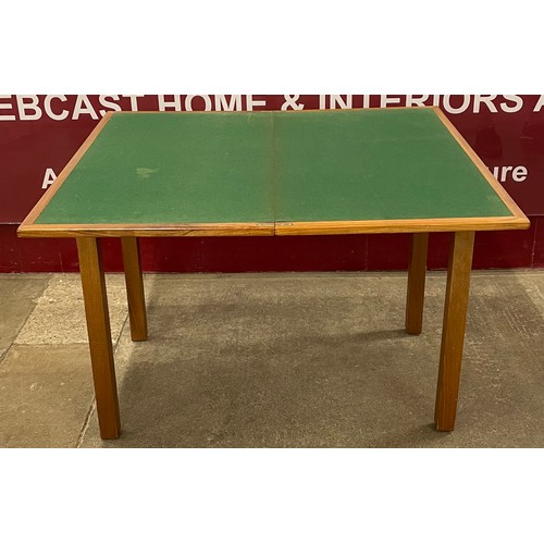 52 - A teak rectangular fold-over card table