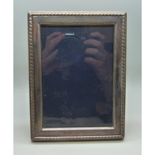 7003 - A silver photograph frame, Sheffield, 1987, 15.8 x 11.8cm, 12.4 x 8.6cm