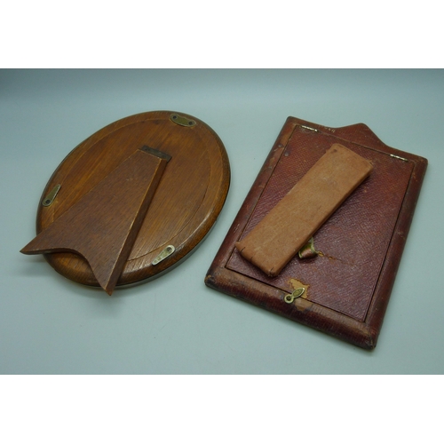 7015 - An oval silver photograph frame, hallmarks worn, a/f, 17cm, and a white metal fronted photograph fra... 