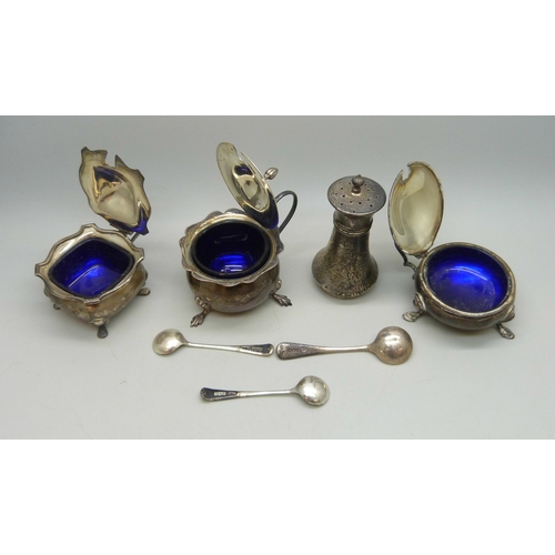 7029 - A collection of unmatched silver cruet pots, 108g of silver without liners, one with liner stuck ins... 