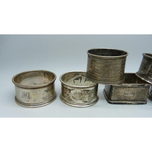 7031 - Seven silver napkin rings, 133g total