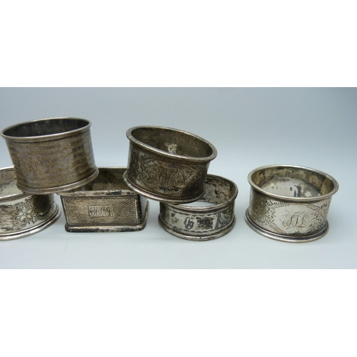 7031 - Seven silver napkin rings, 133g total