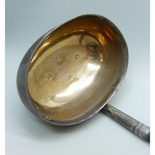 7034 - A silver toddy ladle with ebonised twist handle, Sheffield, 1970, 60g total