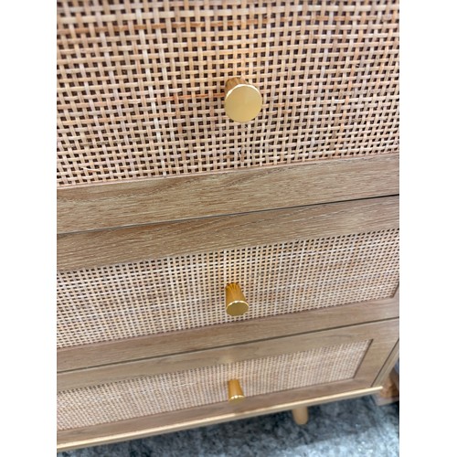 3126 - An oak and rattan 3 drawer chest with brass effect handles