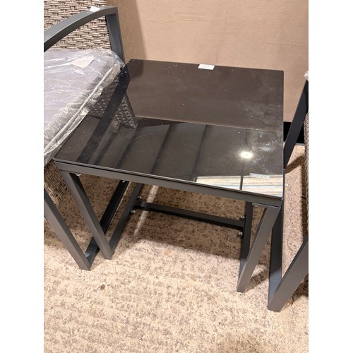 3129 - A three piece rattan bistro set