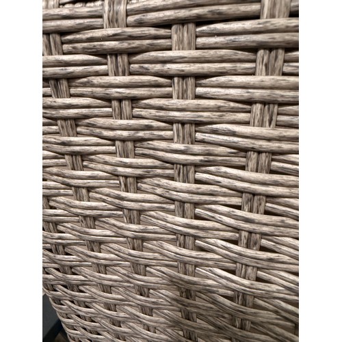 3129 - A three piece rattan bistro set