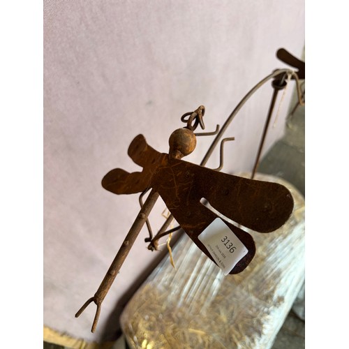 3138 - A rustic effect dragonfly garden decoration