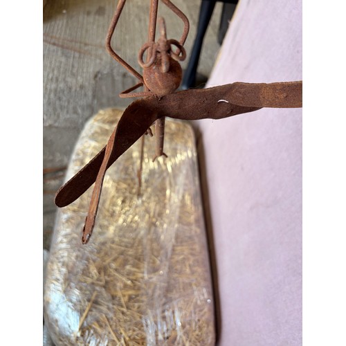 3138 - A rustic effect dragonfly garden decoration