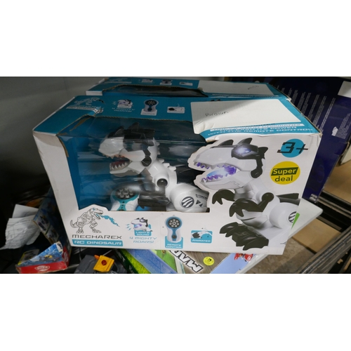 5023 - A large assortment of toys including ride on tractor, mono kart R/C racer, Chuckle Chums, Surprise G... 