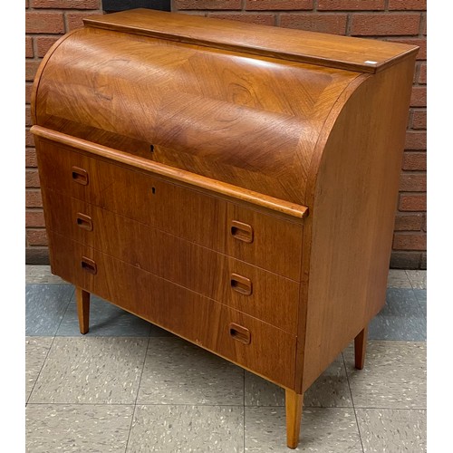 16 - A Swedish S.M.I. teak cylinder bureau, designed by Egon Ostergaard