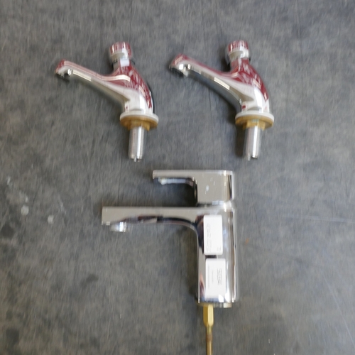 5017 - A pair of stainless steel kitchen push taps and a stainless steel basin mixer tap