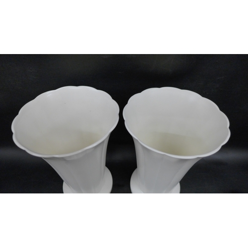 2004 - A pair of Wedgwood Keith Murray vases, 21cm, one with small chip to the side of the base