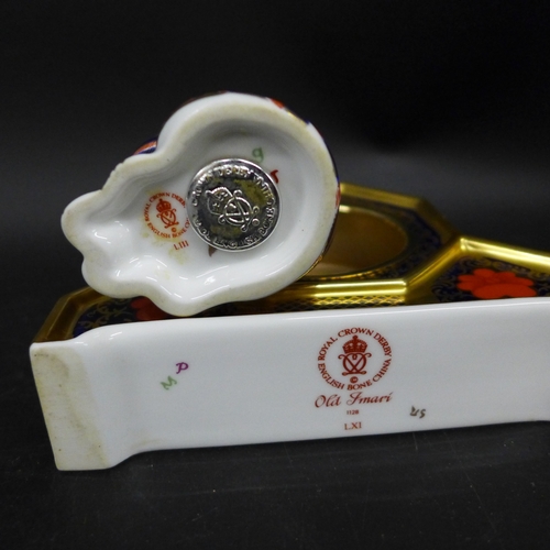2033 - A Royal Crown Derby cat paperweight with silver stopper and a Royal Crown Derby Imari clock case