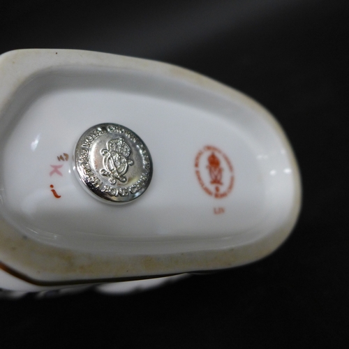 2034 - A Royal Crown Derby Ram paperweight with silver stopper, 14cm h