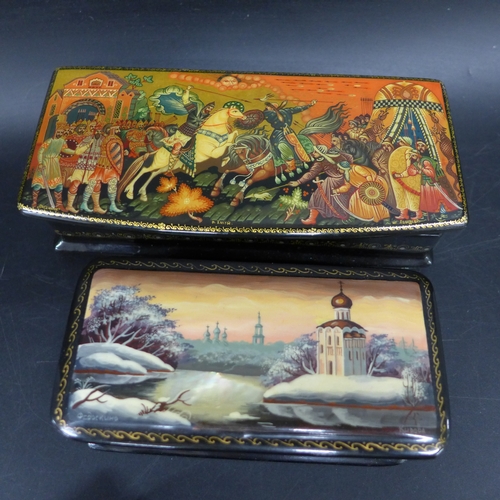 2043 - Three Russian black lacquered boxes with hand-painted scenes on lids, each signed by artist (one a/f... 