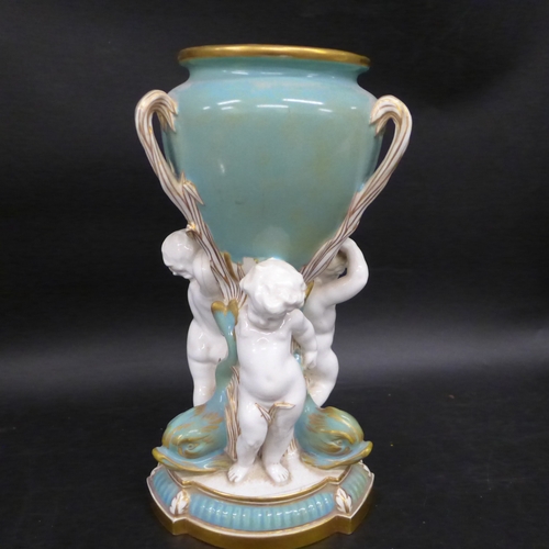 2048 - A late 19th Century Copeland porcelain vase, turquoise amphora shaped vase held by three putti figur... 