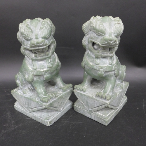 2052 - A pair of carved hardstone Foo dog bookends, 14cm h