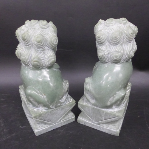 2052 - A pair of carved hardstone Foo dog bookends, 14cm h
