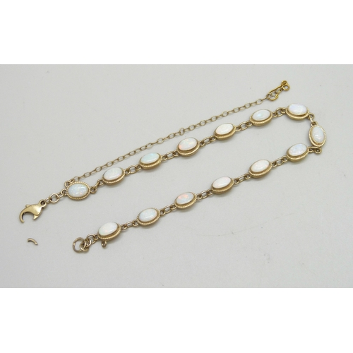 7056 - A 9ct gold and opal line bracelet, clasp a/f, 5.2g, 19.7cm