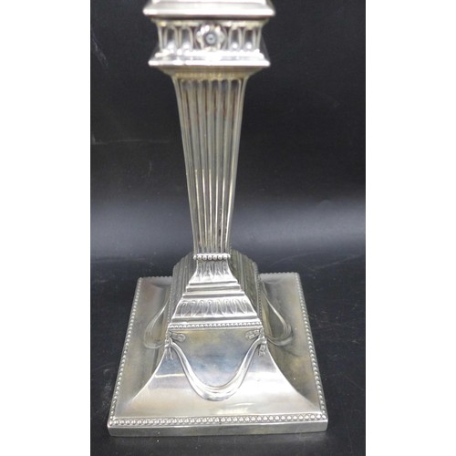 7050 - A pair of Victorian silver Corinthian column candlesticks with Neoclassical swag decoration, Hawkswo... 