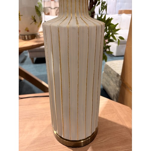 3011 - A cream and gold effect table lamp