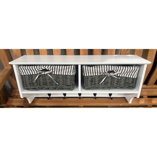 3017 - A white painted wall mounted coat rack and storage