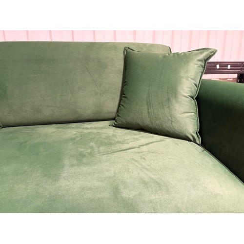 3026 - A Rivan three seater sofa with adjustable back rest *This lot is subject to VAT