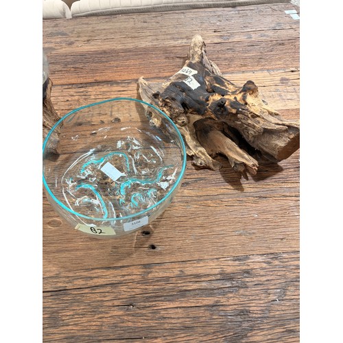 3036 - A large molten glass jar melted over a natural teak root stand