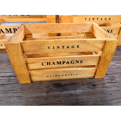 3055 - Three wooden champagne stacking crates