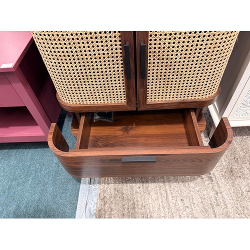 3064 - A curved walnut two door sideboard (marked)