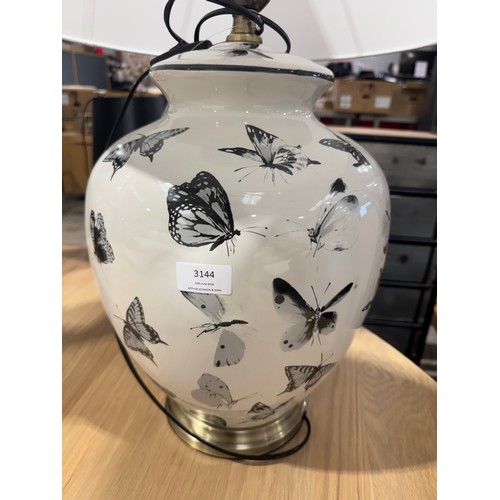 3079 - A black and white butterfly lamp