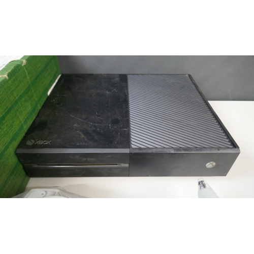 5007 - An XBox One games console, assorted games console controllers and a large quantity of games for Play... 