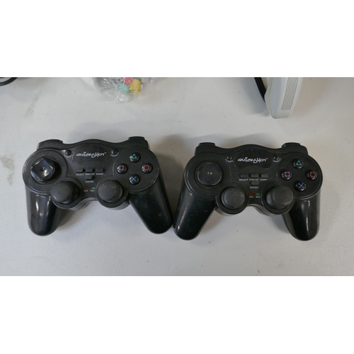 5007 - An XBox One games console, assorted games console controllers and a large quantity of games for Play... 