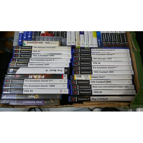 5007 - An XBox One games console, assorted games console controllers and a large quantity of games for Play... 