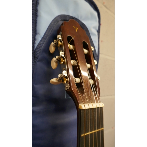 5016 - A Valencia GG-160 acoustic guitar, a Cort G-series electric guitar and a violin