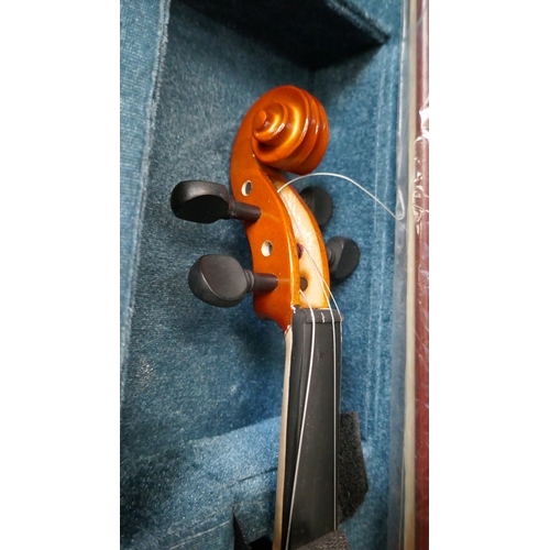 5016 - A Valencia GG-160 acoustic guitar, a Cort G-series electric guitar and a violin