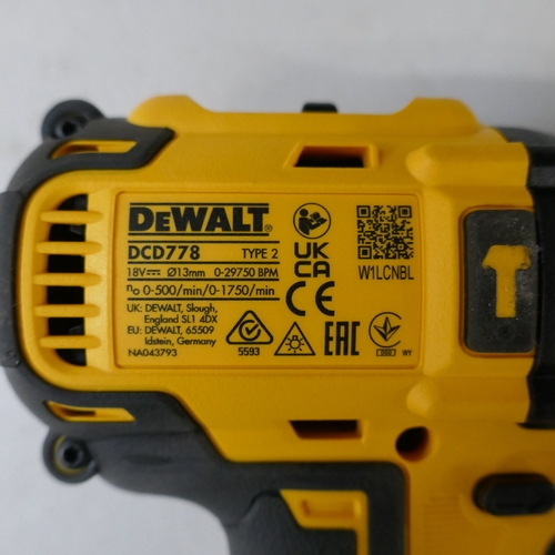 5097 - A DeWalt DCD778, 18v drill, a DeWalt DCB107, 18v battery charger and a DeWalt DWE4056-GB, 240v angle... 