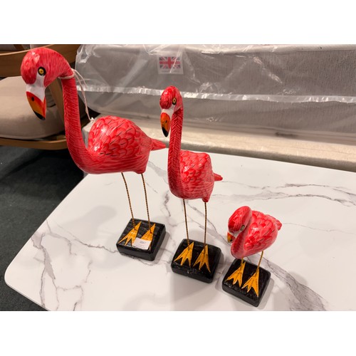 3067 - Three wooden standing flamingo ornaments