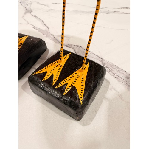 3067 - Three wooden standing flamingo ornaments